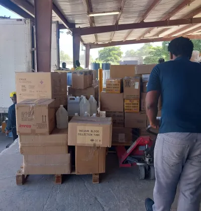 ZL warehouse team unloading medical supplies